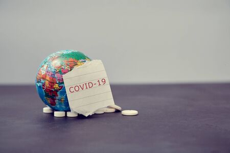 Stop Coronavirus disease outbreak and quarantine. Global virus infection. Globe with pills and...