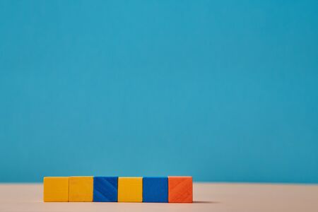 Colourful wooden blocks stack mockup for creative inscription design. Cubes with empty place for text. Background.の写真素材