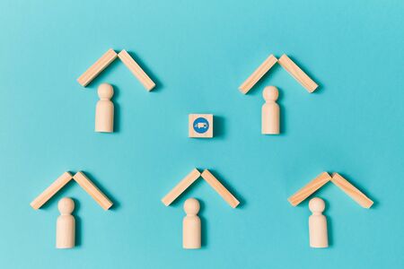 Fast targeted delivery. Online supermarket. E-shopping. E-store. Wooden cube, truck sign and person figures in housesの写真素材