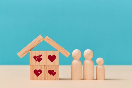 Online dating. Virtual love. Creating family. Love relationship. House of wooden cubes with heart...