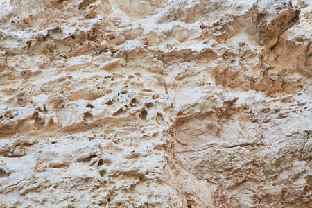 Rock surface. Abstract nature texture. Beige mountain. Natural material background. Rock climbing backdrop, copy spaceの写真素材