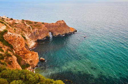Desert island. Summer trip. or Virgin nature. Freedom of Magnificent mountains with greenery. Calming ocean.の写真素材