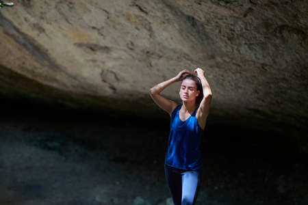 Fitness. and Active lifestyle. Woman wearing sportswear and gloves. Outdoors training. Test of endurance. Copy spaceの写真素材