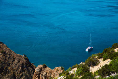 Natural marine or Seascape panorama. Freedom and relax idea. Luxury yacht floating in deep ocean waters.の写真素材