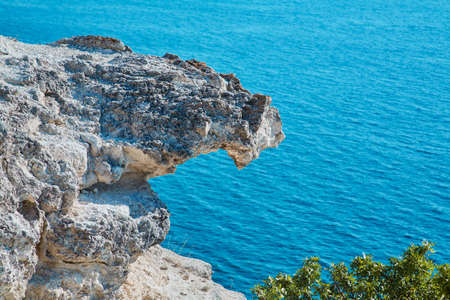 Summer time. Traveling. Virgin nature scenery. Freedom. Sharp cliff. Blue open sea. Stunning...