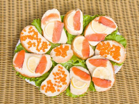 Close up of sandwiches with red caviarの写真素材