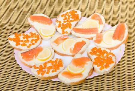 Close up of sandwiches with red caviarの写真素材