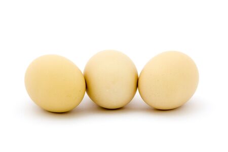 Fresh eggs on white backgroundの写真素材