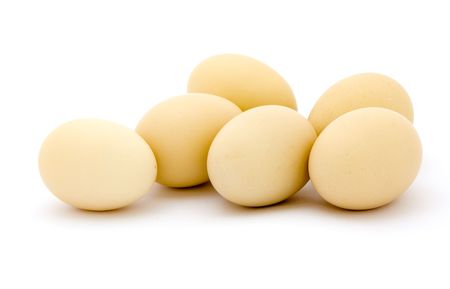 Fresh eggs on white backgroundの写真素材
