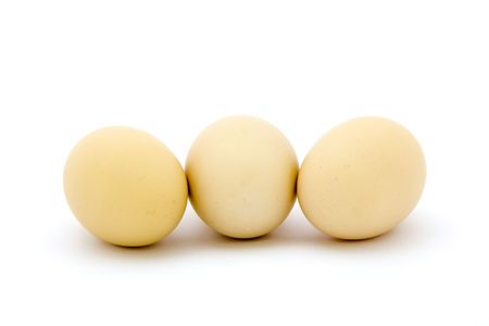 Fresh eggs on white backgroundの写真素材