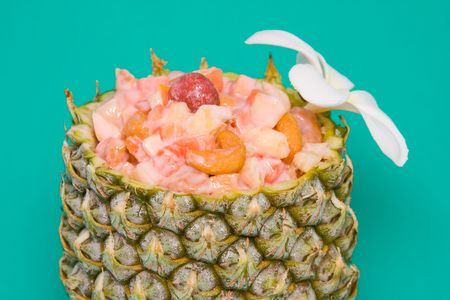Tropical fruit salad in pineappleの写真素材