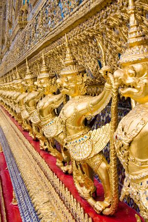 A kind of mythological soldier next to a chedi in Grand Palace.Thailand, Bangkok.の写真素材