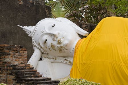 Stone statue of a Buddha in Ayutthaya, Thailand.の写真素材