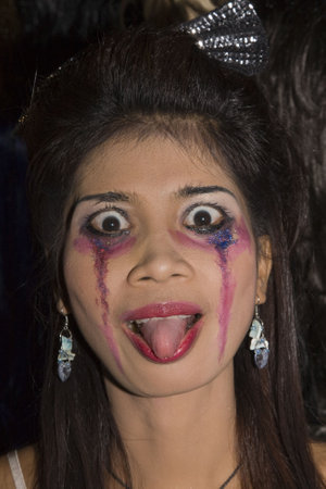 PATTAYA , THAILAND - OCTOBER 31 : Thai girl celebrates Halloween on October 31 2010 in Pattaya, Thailand. Halloween has become popular in Thailand in recent years .のeditorial素材