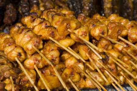 Delicious chicken satay on skewers in asiaの写真素材