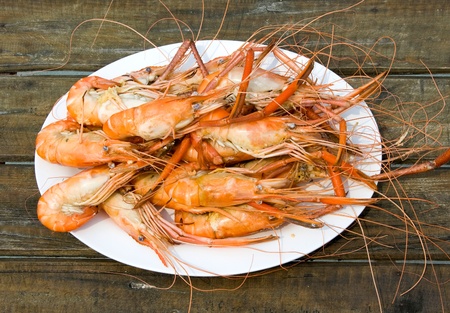 Boiled shrimp on a white plate .の写真素材