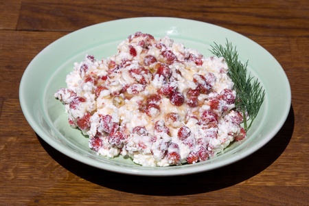 Cottage cheese with strawberries and honey .の写真素材