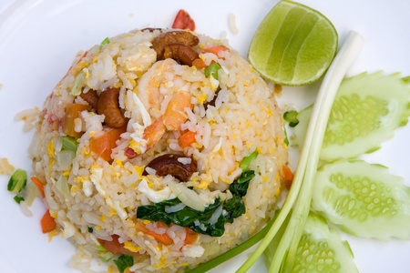 delicious seafood fried rice with shrimp, crab eggs and a light garnishing of spring onions. served with traditional sauces.の写真素材