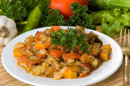 Ragout of vegetables on the white plateの写真素材