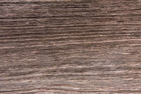 Old cracked weathered wood natural texture backgroundの写真素材