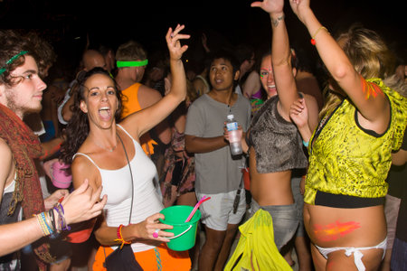 PHANGAN - DECEMBER 10 : There are about 10,000 people every month at this Phangan beach Full moon party, on December 10, 2011 in Koh Phangan , Thailand .のeditorial素材