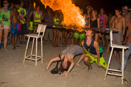 PHANGAN - DECEMBER 10 : There are about 10,000 people every month at this Phangan beach Full moon party, on December 10, 2011 in Koh Phangan , Thailand .のeditorial素材