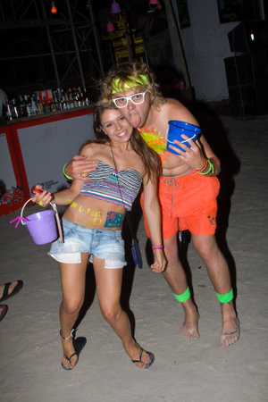 PHANGAN - DECEMBER 10 : There are about 10,000 people every month at this Phangan beach Full moon party, on December 10, 2011 in Koh Phangan , Thailand .のeditorial素材