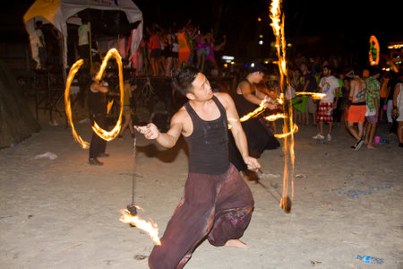 PHANGAN - DECEMBER 10 : There are about 10,000 people every month at this Phangan beach Full moon party, on December 10, 2011 in Koh Phangan , Thailand .のeditorial素材