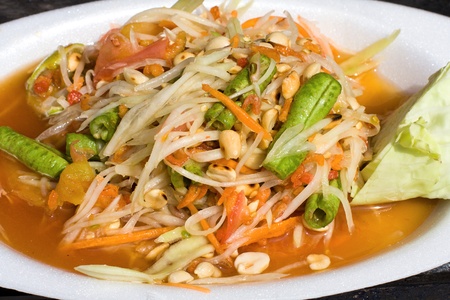 Thai papaya salad also known as Som Tam from Thailand.の写真素材