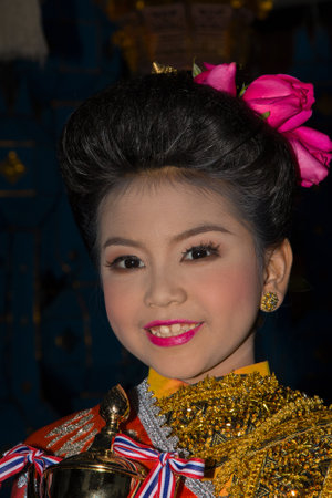CHIANG MAI, THAILAND - NOVEMBER 10: Thai little girl takes part in the opening parade of the Loy Krathong Festival in Chiang Mai, Thailand on November 10, 2011のeditorial素材