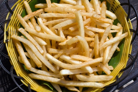 Close up of hot french fries  on a plate