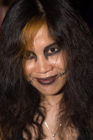 PATTAYA , THAILAND - OCTOBER 31 : Thai girl celebrates Halloween on October 31, 2011 in Pattaya, Thailand. Halloween has become popular in Thailand in recent years .のeditorial素材