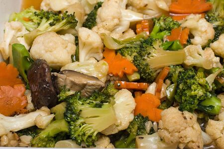 Broccoli salad with carrot and mushroomsの写真素材