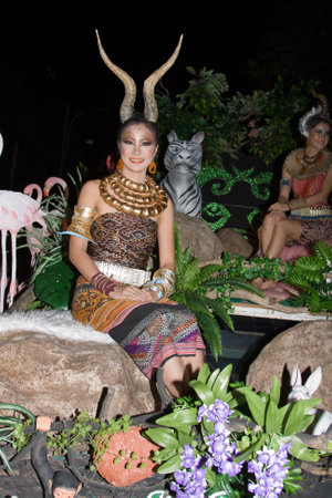 CHIANG MAI, THAILAND - NOVEMBER 11: Thai lady takes part in a parade of the Loy Krathong Festival in Chiang Mai, Thailand on November 11, 2011のeditorial素材