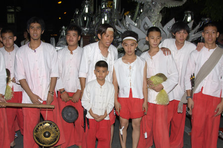 CHIANG MAI, THAILAND - NOVEMBER 11: Thai boys takes part in a parade of the Loy Krathong Festival in Chiang Mai, Thailand on November 11, 2011のeditorial素材