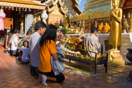 CHIANG MAI, THAILAND - NOVEMBER 11:Thai people are praying for a religious ceremony in the Doi Suthep temple during the Loy Krathong festival in Chiang Mai, Thailand on November 11, 2011のeditorial素材
