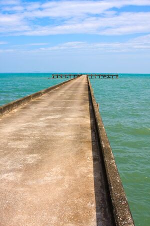 Jetty, sea and cloudscapeの写真素材