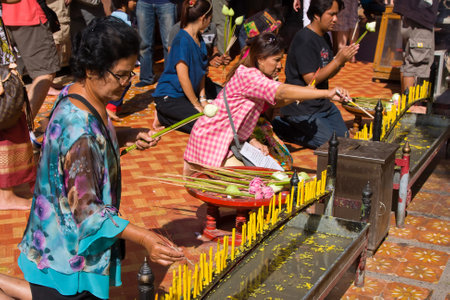 CHIANG MAI, THAILAND - NOVEMBER 11:Thai people are praying for a religious ceremony in the Doi Suthep temple during the Loy Krathong festival in Chiang Mai, Thailand on November 11, 2011のeditorial素材