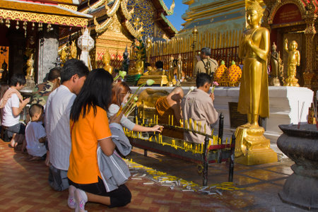 CHIANG MAI, THAILAND - NOVEMBER 11:Thai people are praying for a religious ceremony in the Doi Suthep temple during the Loy Krathong festival in Chiang Mai, Thailand on November 11, 2011のeditorial素材