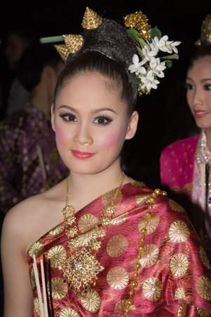 CHIANG MAI, THAILAND - NOVEMBER 11: Thai lady takes part in a parade of the Loy Krathong Festival in Chiang Mai, Thailand on November 11, 2011のeditorial素材