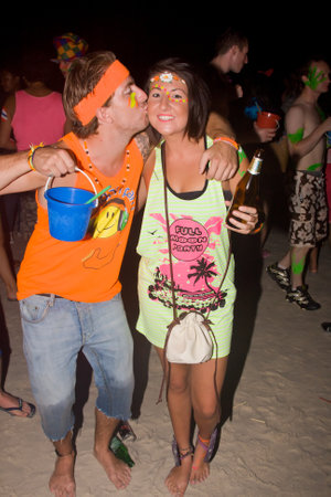 PHANGAN - DECEMBER 10 : There are about 10,000 people every month at this Phangan beach Full moon party, on December 10, 2011 in Koh Phangan , Thailand .のeditorial素材