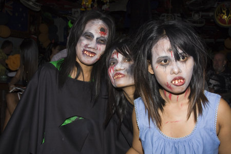 PATTAYA , THAILAND - OCTOBER 31 : Thai girls celebrate Halloween on October 31 2010 in Pattaya, Thailand. Halloween has become popular in Thailand in recent years .のeditorial素材