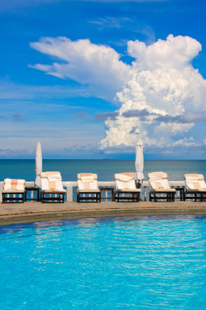 Chaise lounges by the sea in Thailandのeditorial素材