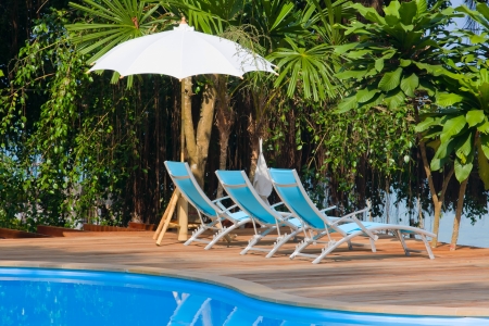 Swimming pool by the sea in Thailandの写真素材