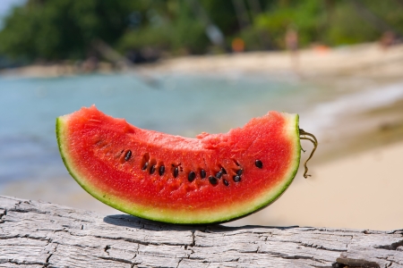 Juicy slice of watermelon against natural backgroundの写真素材