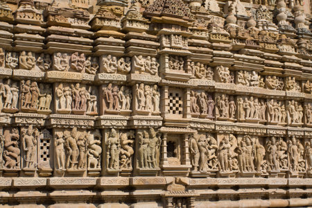 India: Temples of Khajuraho, one of the most popular tourist destinations in India, and famous for their erotic sculptures. のeditorial素材