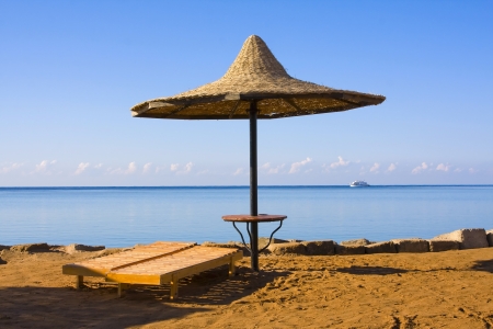 Straw umbrella on the beach, Egypt .の写真素材
