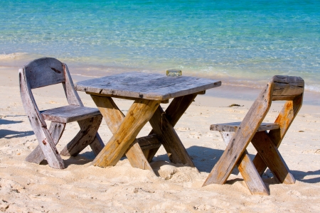 Table and chairs with a beautiful sea view on island Koh Phangan, Thailand.の写真素材