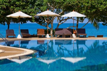 Swimming pool by the sea on island Koh Phangan,Thailandの写真素材
