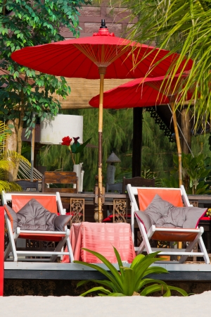 Beach umbrella and deck chairs on the beach. Island Koh Phangan,Thailandの写真素材